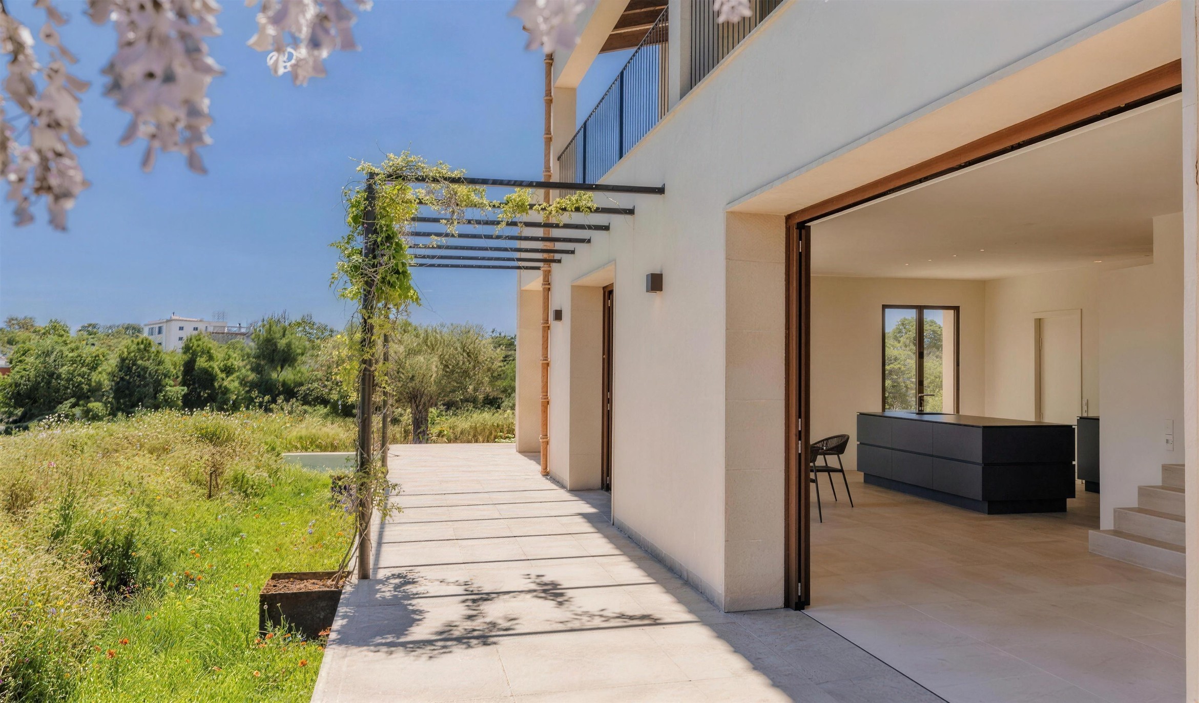 Lucera 12 Lucera, Cala Llombards, Mallorca – dining area with glass fronts opening to the terrace