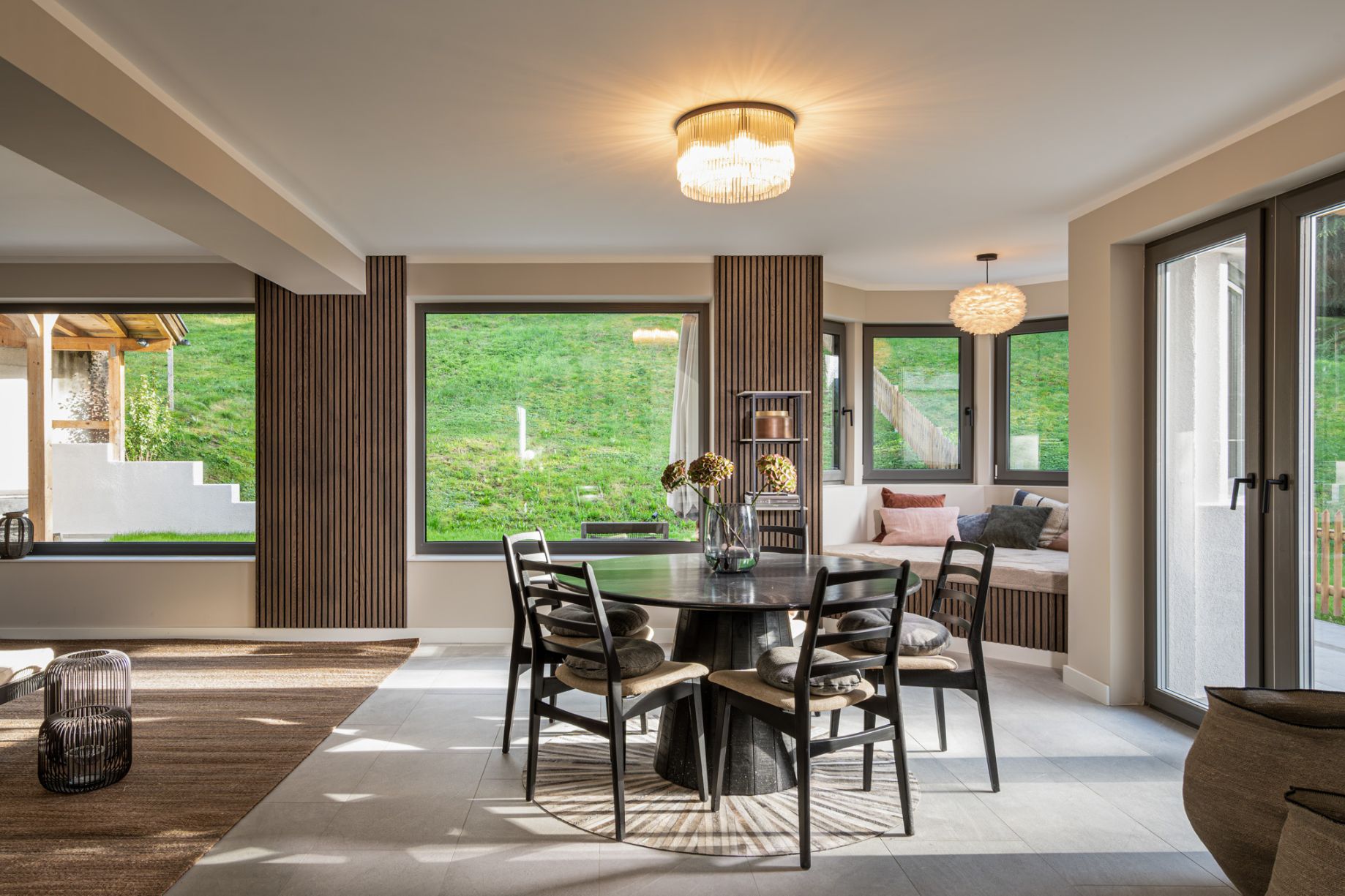chalet-brixental-at0631a-03-1 Chalet Niederau — open living and dining area with mountain views